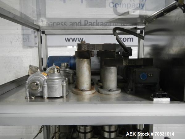 Used Resina Model RT20-53 Cap Tightener Retorquer. Capable of speeds up to 90 bottles per minute. Cap size range: 13mm to 38mm. C frame desing, has two sets of cap tightening wheel, single side belt ...