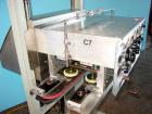 Used Elf model AC1600 (6) quill cap tightener. 3 sets of quills, last set of quills with mechanical clutch for torque application, 24 in long x 3/4 in single rubber bottle gripper belts, belt and gri...