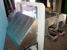 Used Elf model AC1600 (6) quill cap tightener. 3 sets of quills, last set of quills with mechanical clutch for torque application, 24 in long x 3/4 in single rubber bottle gripper belts, belt and gri...