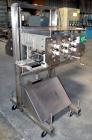 Used ELF ACT600L Automatic cap tightener. (6) Quill, rated up to 100 containers per minute. Cap size range 10mm-110mm diameter. Single belt unit C frame design. Mounted on casters. SELLING PRICE, AS ...