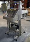 Used ELF ACT600L Automatic cap tightener. (6) Quill, rated up to 100 containers per minute. Cap size range 10mm-110mm diameter. Single belt unit C frame design. Mounted on casters. SELLING PRICE, AS ...