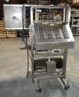 Used ELF ACT600L Automatic cap tightener. (6) Quill, rated up to 100 containers per minute. Cap size range 10mm-110mm diameter. Single belt unit C frame design. Mounted on casters. SELLING PRICE, AS ...