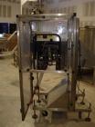 Used E-Pak (ELF) Semi Automatic Six Spindle Capper. (3) sets of (2) spindles. With cap chute feeder, cabable of speeds up to 120 CPM. Has C frame design to roll up to existing conveyor line. Cap size...