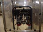 Used E-Pak (ELF) Semi Automatic Six Spindle Capper. (3) sets of (2) spindles. With cap chute feeder, cabable of speeds up to 120 CPM. Has C frame design to roll up to existing conveyor line. Cap size...