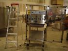 Used E-Pak (ELF) Semi Automatic Six Spindle Capper. (3) sets of (2) spindles. With cap chute feeder, cabable of speeds up to 120 CPM. Has C frame design to roll up to existing conveyor line. Cap size...