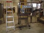 Used E-Pak (ELF) Semi Automatic Six Spindle Capper. (3) sets of (2) spindles. With cap chute feeder, cabable of speeds up to 120 CPM. Has C frame design to roll up to existing conveyor line. Cap size...