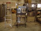 Used E-Pak (ELF) Semi Automatic Six Spindle Capper. (3) sets of (2) spindles. With cap chute feeder, cabable of speeds up to 120 CPM. Has C frame design to roll up to existing conveyor line. Cap size...