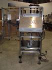 Used E-Pak (ELF) Semi Automatic Six Spindle Capper. (3) sets of (2) spindles. With cap chute feeder, cabable of speeds up to 120 CPM. Has C frame design to roll up to existing conveyor line. Cap size...