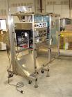 Used E-Pak (ELF) Semi Automatic Six Spindle Capper. (3) sets of (2) spindles. With cap chute feeder, cabable of speeds up to 120 CPM. Has C frame design to roll up to existing conveyor line. Cap size...