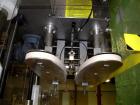 Used Kaps-All Model F4 Inline Quill Cap Tightener/Retorquer. Capable of speeds over 150 BPM. Cap size range: 13 to 70mm. Has single belt side grippers, C frame design with painted base. Last used in ...