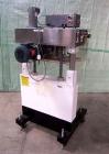 Used Kaps-All Model F4 Inline Quill Cap Tightener/Retorquer. Capable of speeds over 150 BPM. Cap size range: 13 to 70mm. Has single belt side grippers, C frame design with painted base. Last used in ...