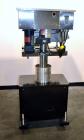 Used Filamatic (National Instruments) Model DL-4-CT 4 Quill Automatic Cap Tightening Machine. Capable of 80 containers per minute. (2) 2’’ Widex 19’’ long gripper belts, driven by a 1/2 hp, 90 volt D...