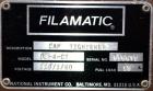 Used Filamatic (National Instruments) Model DL-4-CT 4 Quill Automatic Cap Tightening Machine. Capable of 80 containers per minute. (2) 2’’ Widex 19’’ long gripper belts, driven by a 1/2 hp, 90 volt D...