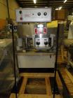 Used Kaps-All Model F4 Inline Quill Cap Tightener or Retorquer capable of speeds over 150 BPM. Cap size range: 13 to 70 mm. Has single belt side grippers, C frame design with painted base. Last used ...