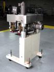 Used Kaps-All Model F4 Inline Quill Cap Tightener or Retorquer. Capable of speeds over 150 BPM. Cap size range: 13 to 70 mm. Has single belt side grippers 25