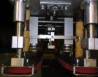 Used Kaps-All Model F4 Inline Quill Cap Tightener or Retorquer. Capable of speeds over 150 BPM. Cap size range: 13 to 70 mm. Has single belt side grippers 25