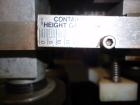 Used Kaps-All Model F4 Inline Quill Cap Tightener or Retorquer. Capable of speeds over 150 BPM. Cap size range: 13 to 70 mm. Has single belt side grippers 25