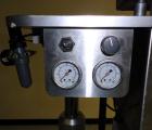 Used Kaps-All Model F4 Inline Quill Cap Tightener or Retorquer. Capable of speeds over 150 BPM. Cap size range: 13 to 70 mm. Has single belt side grippers 25