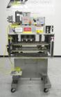 Used Kaps-All Model FA6 Industrial 6-Spindle Cap Retorquer. Machine is capable of speeds from 20 to 200 bottles per minute. Can handle caps of all materials from 8mm to 70mm (diameter). Can do pilfer...