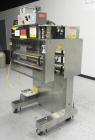 Used Kaps-All Model FA6 Industrial 6-Spindle Cap Retorquer. Machine is capable of speeds from 20 to 200 bottles per minute. Can handle caps of all materials from 8mm to 70mm (diameter). Can do pilfer...