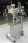 Used Kaps-All Model FA6 Industrial 6-Spindle Cap Retorquer. Machine is capable of speeds from 20 to 200 bottles per minute. Can handle caps of all materials from 8mm to 70mm (diameter). Can do pilfer...