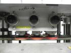 Used Kaps-All Model FA6 Industrial 6-Spindle Cap Retorquer. Machine is capable of speeds from 20 to 200 bottles per minute. Can handle caps of all materials from 8mm to 70mm (diameter). Can do pilfer...