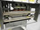 Used Kaps-All Model FA6 Industrial 6-Spindle Cap Retorquer. Machine is capable of speeds from 20 to 200 bottles per minute. Can handle caps of all materials from 8mm to 70mm (diameter). Can do pilfer...
