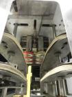 Used Kaps-All Model FA6 Industrial 6-Spindle Cap Retorquer. Machine is capable of speeds from 20 to 200 bottles per minute. Can handle caps of all materials from 8mm to 70mm (diameter). Can do pilfer...