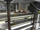 Used Kaps-All Model FA6 Industrial 6-Spindle Cap Retorquer. Machine is capable of speeds from 20 to 200 bottles per minute. Can handle caps of all materials from 8mm to 70mm (diameter). Can do pilfer...