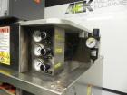Used Kaps-All Model FA6 Industrial 6-Spindle Cap Retorquer. Machine is capable of speeds from 20 to 200 bottles per minute. Can handle caps of all materials from 8mm to 70mm (diameter). Can do pilfer...