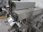 Used Kiss Packaging Model CT-04 Automatic Cap Tightener/Retorquer. Capable of speeds over 100 containers per minute. Has an adjustable cap size range from 13mm - 110mm. Has single belt grippers, hand...