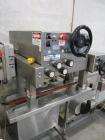 Used Kiss Packaging Model CT-04 Automatic Cap Tightener/Retorquer. Capable of speeds over 100 containers per minute. Has an adjustable cap size range from 13mm - 110mm. Has single belt grippers, hand...