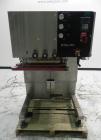 Used New Jersey Machine Model RTQ-150 Cap Tightener and Retorquer. Capable of speeds up to 300 bottles per minute. Stainless steel frame, mounts over existing conveyor. Has single side gripper belts....