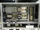 Used New Jersey Machine Model RTQ-150 Cap Tightener and Retorquer. Capable of speeds up to 300 bottles per minute. Stainless steel frame, mounts over existing conveyor. Has single side gripper belts....