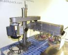Used Kinsley Universal Roll-Tite Semi- Automatic Two Spindle Cap Tightener/ Retorquer, Model DM4350. Capable of speeds up to 200 containers per minute. Cap size range maximum 5-3/8’’ diameter without...