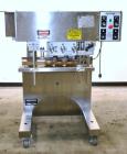 Used Healthstar Puretorque Cap Tightener & Retorquer, Model PT 500. Capable of speeds over 200 bottles per minute. Has six quills and single side belt grippers (double grip station can be added for t...