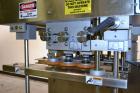 Used Healthstar Puretorque Cap Tightener & Retorquer, Model PT 500. Capable of speeds over 200 bottles per minute. Has six quills and single side belt grippers (double grip station can be added for t...