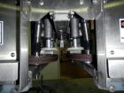 Used Pack West Auto Model AC-120 Cap Tightener & Retorquer. Capable of speeds up to 150 containers per minute. Cap size range: up to 53mm. All stainless steel frame. C frame design, mounts over exist...
