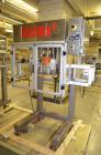 Used Resina Model RT-20 cap tightener retorquer. Capable of speeds up to 90 bottles per minute. Cap size range: 13mm t0 38mm. C frame desing, has two sets of cap tightening wheel, single side belt gr...