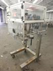 Used Resina Model RT-20 Cap Tightener Retorquer capable of speeds up to 90 bottles per minute. Cap size range: 13mm to 38mm. C frame design, has two sets of cap tightening wheels, single side belt gr...