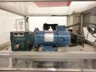 Used Resina Model RT-20 Cap Tightener Retorquer capable of speeds up to 90 bottles per minute. Cap size range: 13mm to 38mm. C frame design, has two sets of cap tightening wheels, single side belt gr...