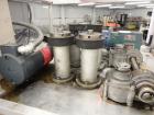 Used Resina Model RT-20 Cap Tightener Retorquer capable of speeds up to 90 bottles per minute. Cap size range: 13mm to 38mm. C frame design, has two sets of cap tightening wheels, single side belt gr...
