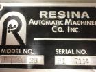 Used Resina Model RT-20 cap tightener retorquer. Capable of speeds up to 90 bottles per minute. Cap size range: 13mm to 38mm. C frame desing, has two sets of cap tightening wheel, single side belt gr...