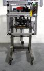 Used Resina Model RT20-53 Cap Tightener Retorquer. Capable of speeds up to 90 bottles per minute. Cap size range: 13mm to 38mm. C frame desing, has two sets of cap tightening wheel, single side belt ...