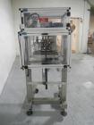 Used Resina Model RT20-53 Cap Tightener Retorquer. Capable of speeds up to 90 bottles per minute. Cap size range: 13mm to 38mm. C frame desing, has two sets of cap tightening wheel, single side belt ...