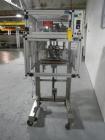 Used Resina Model RT20-53 Cap Tightener Retorquer. Capable of speeds up to 90 bottles per minute. Cap size range: 13mm to 38mm. C frame desing, has two sets of cap tightening wheel, single side belt ...