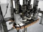 Used Resina Model RT20-53 Cap Tightener Retorquer. Capable of speeds up to 90 bottles per minute. Cap size range: 13mm to 38mm. C frame desing, has two sets of cap tightening wheel, single side belt ...