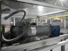 Used Resina Model RT20-53 Cap Tightener Retorquer. Capable of speeds up to 90 bottles per minute. Cap size range: 13mm to 38mm. C frame desing, has two sets of cap tightening wheel, single side belt ...