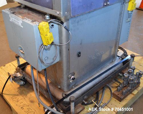 Used Consolidated Capem Model C4HB 8 Head Rotary Cap Press with Star Wheel Infeed and Discharge.