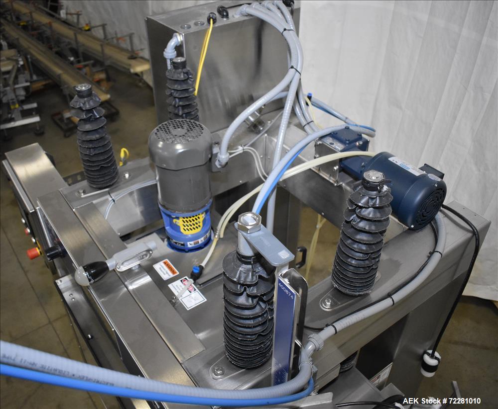 Used Pack West Model In-Line VS Snap Capper/Dose Cup Applicator.
